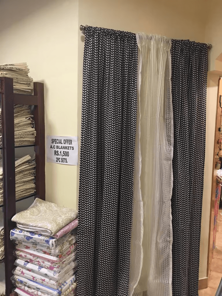 Black Dotted curtains with white blinds